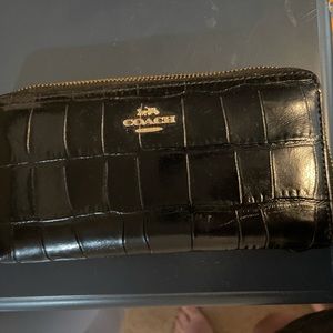 Black Coach Wallet used but great condition.